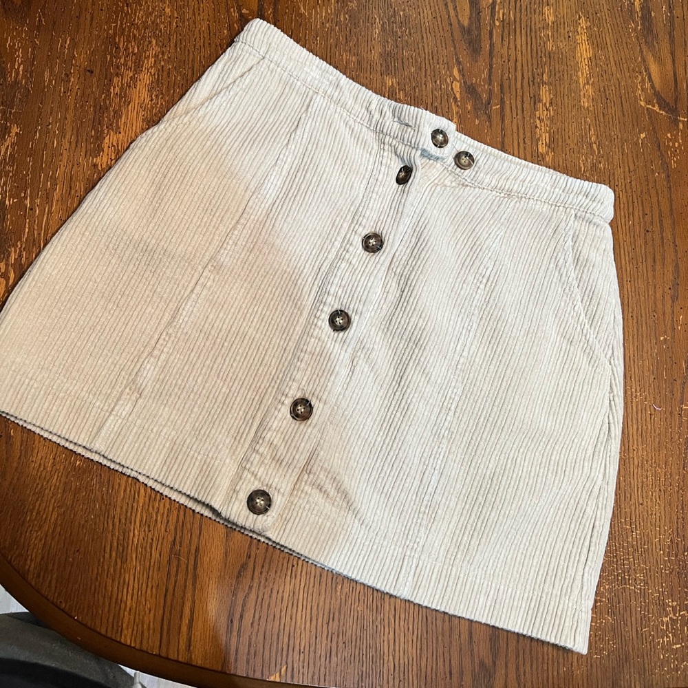 cream colored button skirt